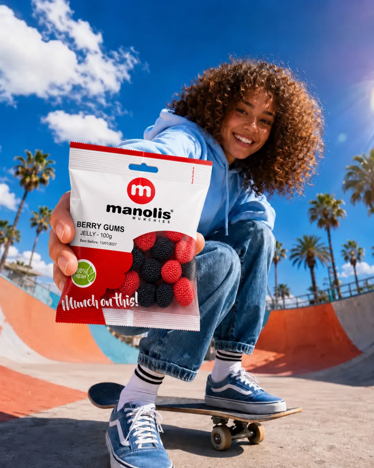 Skateboarder presenting a Manolis Berry Gums pack